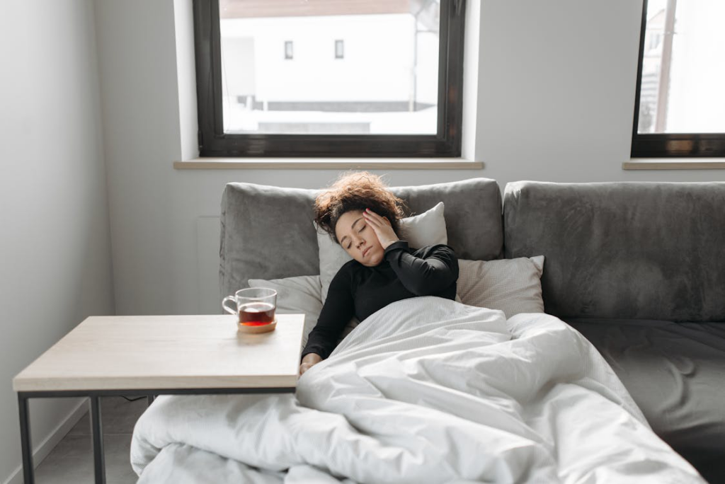 a woman resting and having tea.