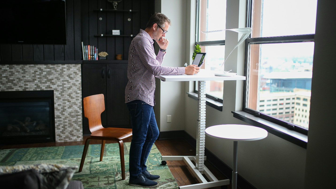 A picture of a person working at home office