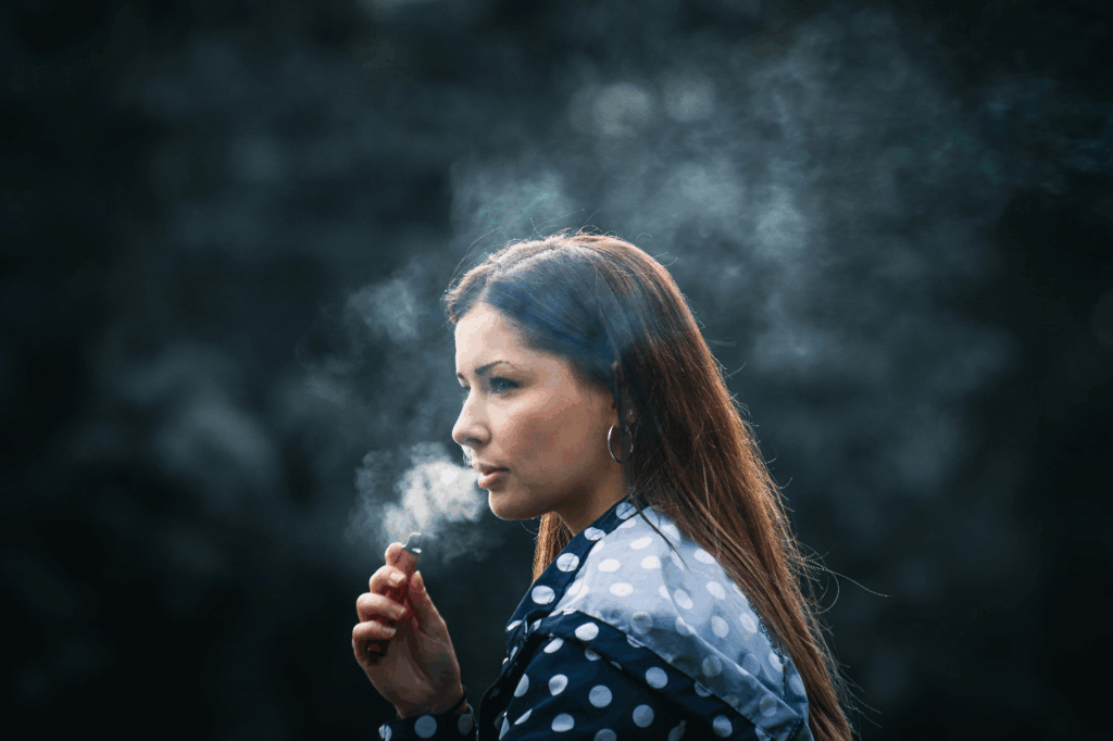 A picture of a person using vape