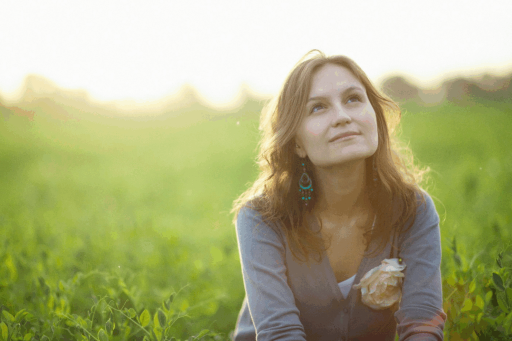 A picture of a person looking at the sky
