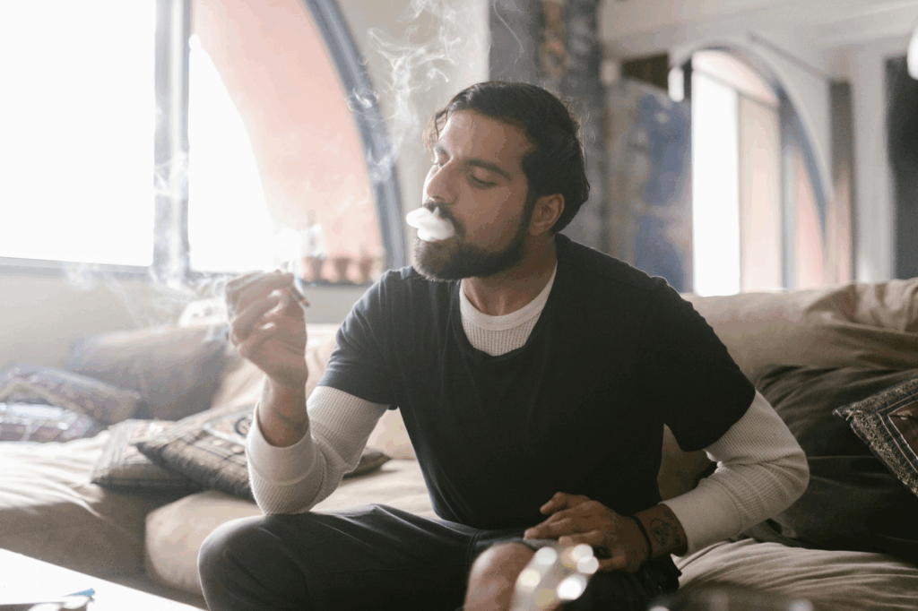 A picture of a person smoking a pre-roll
