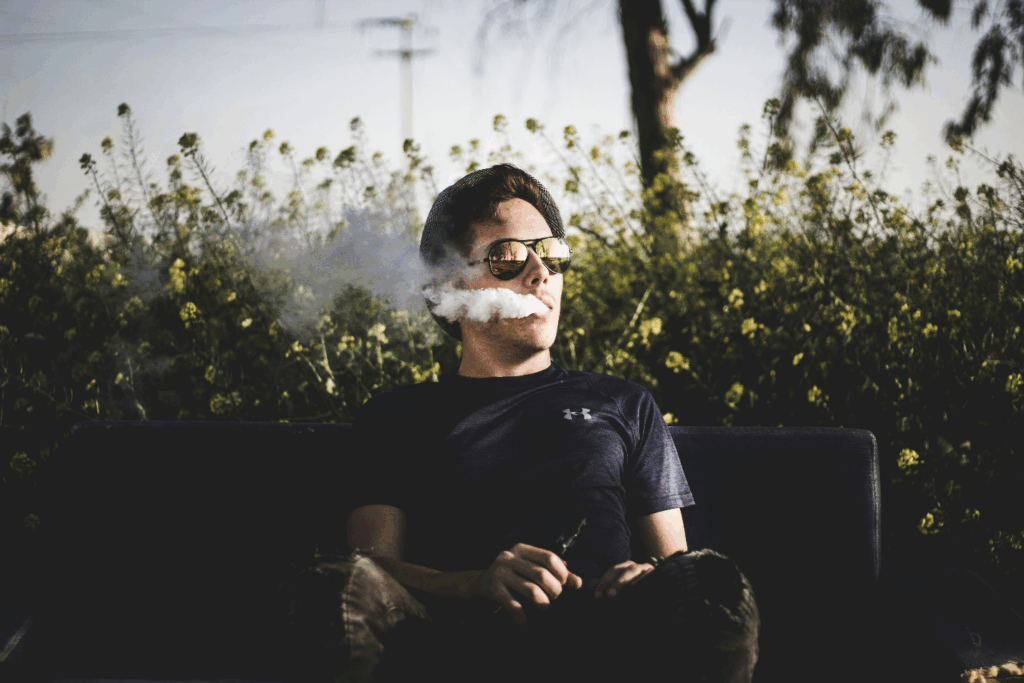 A picture of a person using vape