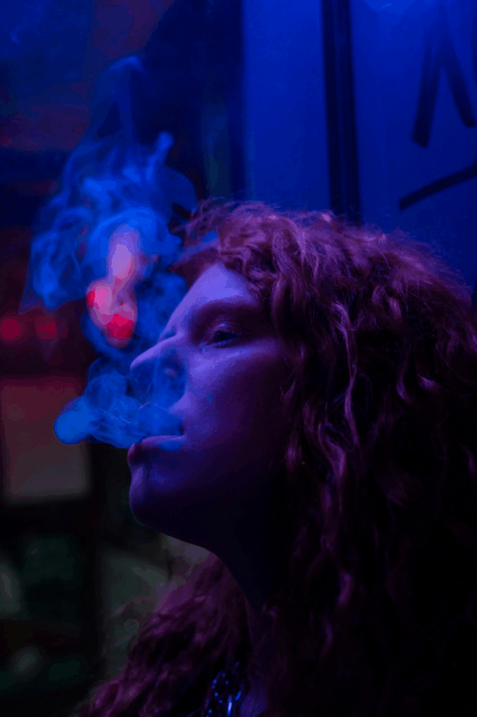 A picture of a person using vape