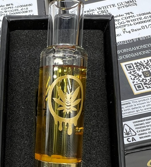 California honey live resin vape cartridge digital art with golden, refined detailing.