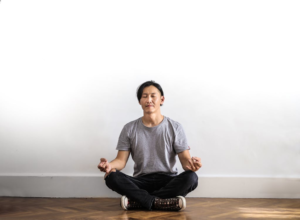 An image of a man meditating