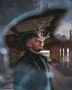 Close-up of a man vaping