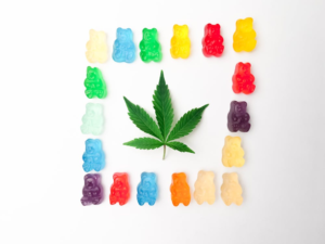 An image of a cannabis leaf and gummies digital art