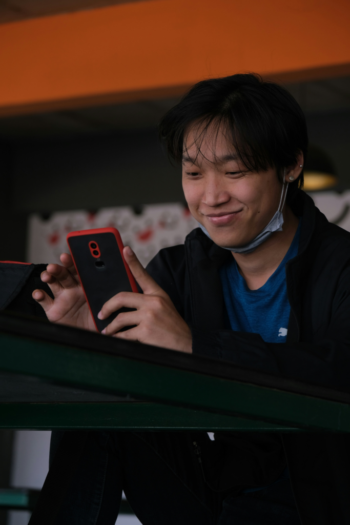 Person using a smartphone during a calm and low-pressure personal moment