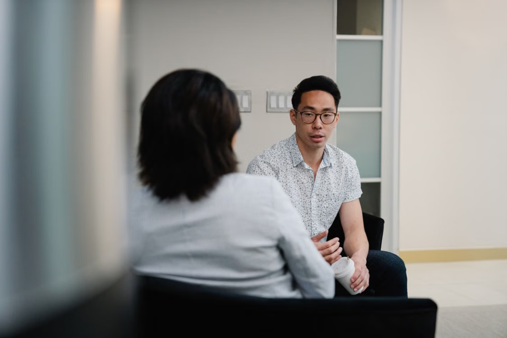 two people in conversation
