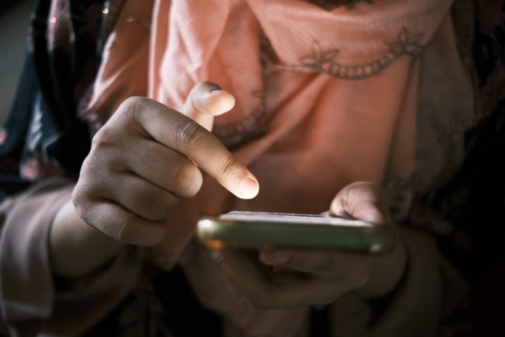 a person scrolling a phone
