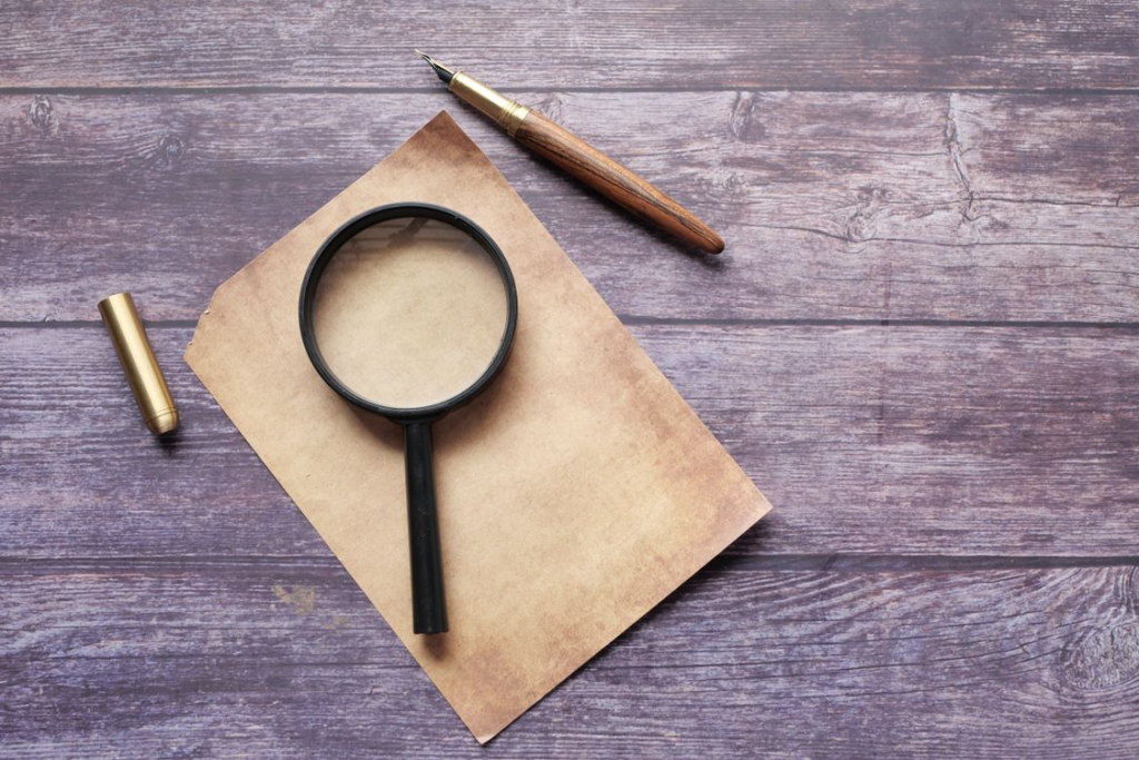 a magnifying glass on paper