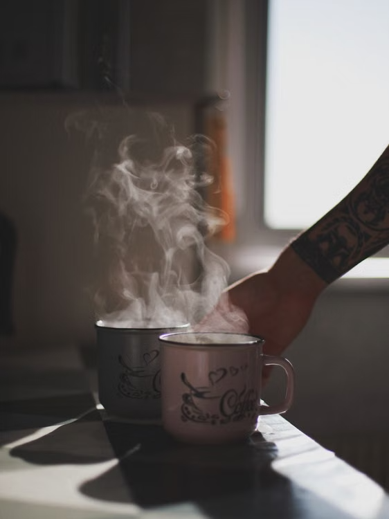 two mugs on a counter