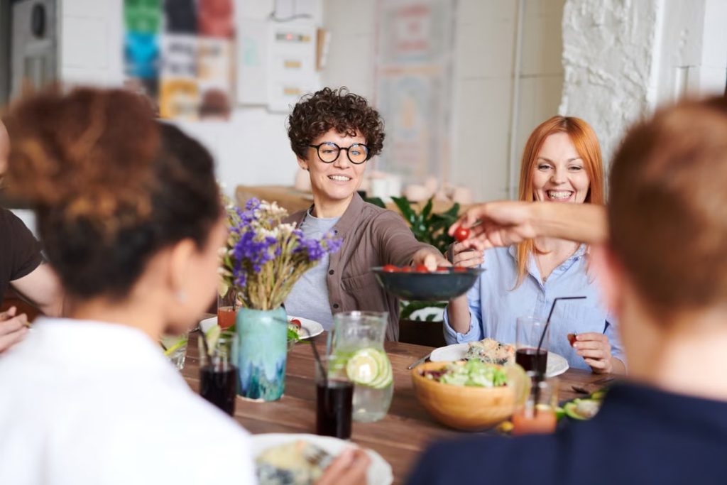 People sharing meal at table