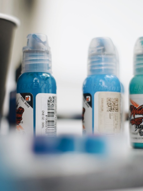  labeled bottles in rows